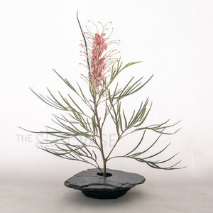pink grevilia arrangement in slate stone vase medium