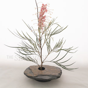 pink grevilia arrangement in slate stone vase medium