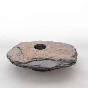 side profile of slate stone vase